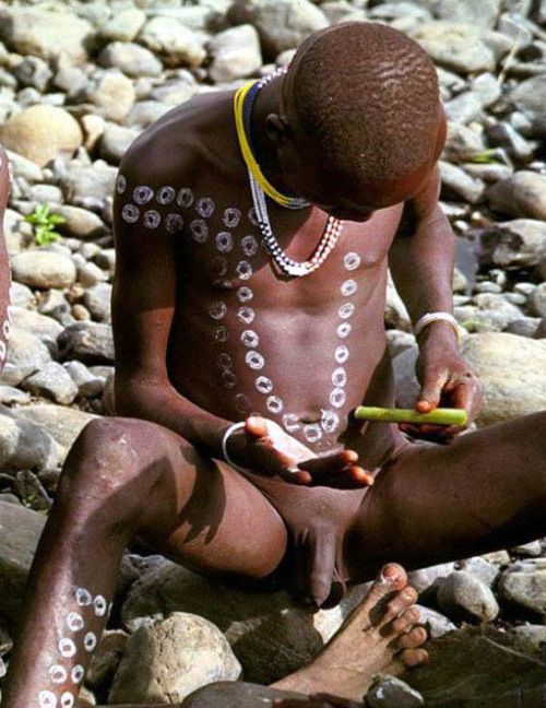 Nude young boys from africa, naked african boys in the outdoor.